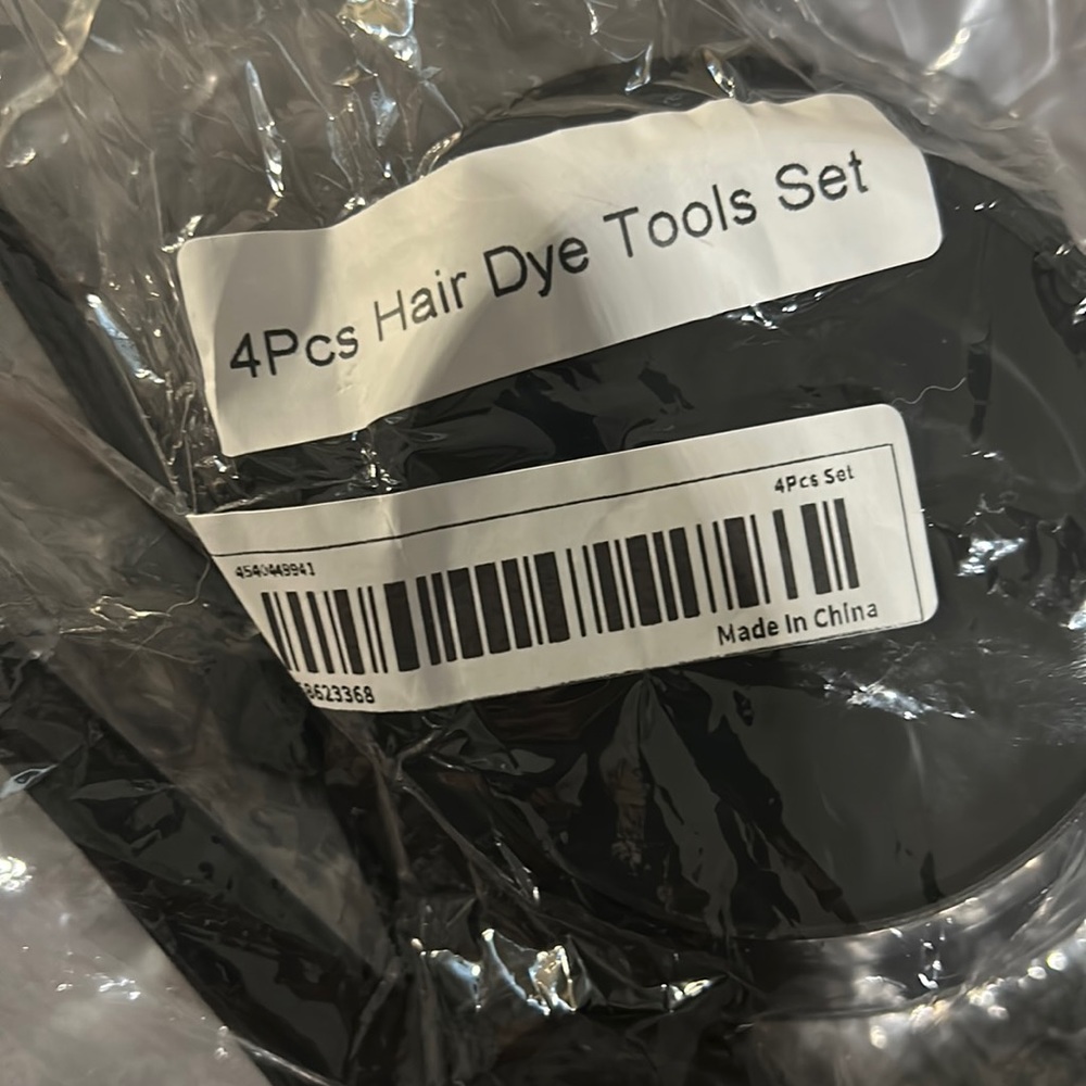 Four piece hair dye tool set